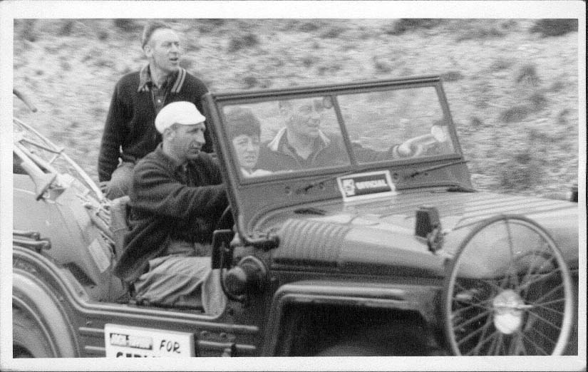 Norman driving the Taylor Race service vehicle an Austin Champ at the Vaux